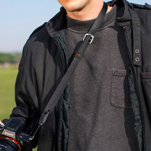 Alvin's black leash setup as sling carry